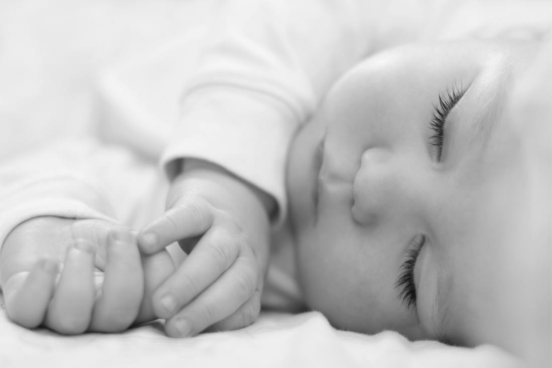 Baby sleeping on side | Safe Sleep Space