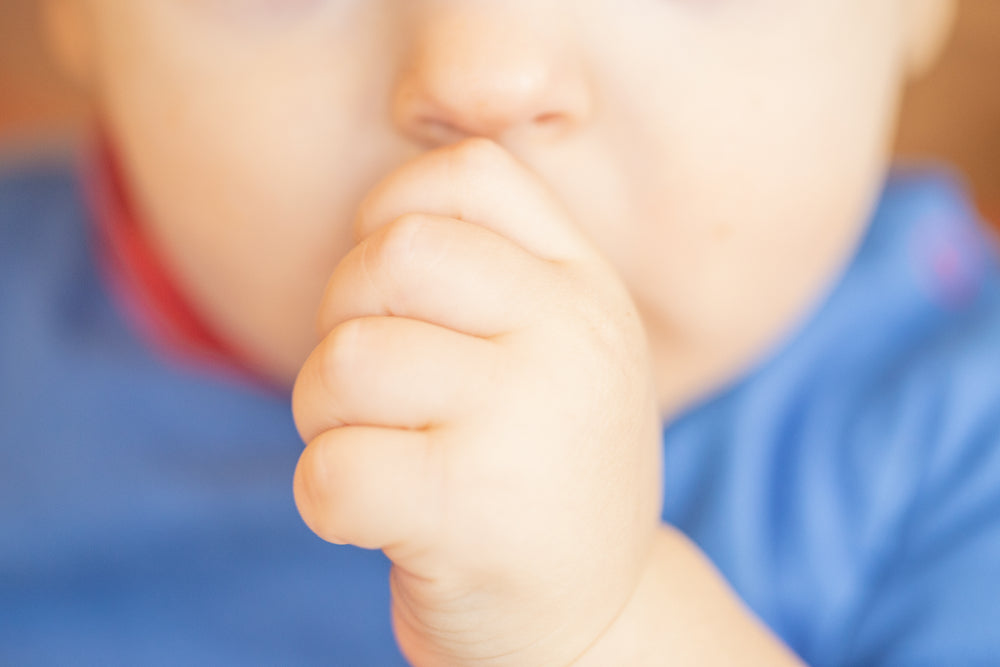 baby sucking thumb