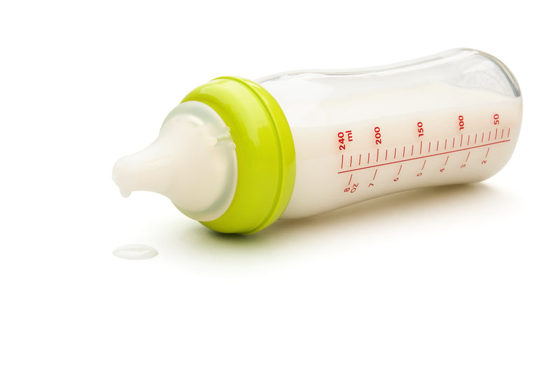 A baby's bottle full of milk | Safe Sleep Space
