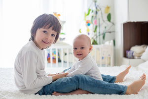 What to consider when moving your baby and toddler in together